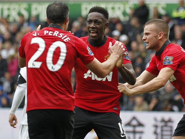 Manchester United's English striker Danny Welbeck celebrates scoring his team's second goal during the English Premier League football match between Swansea City and Manchester United at Liberty Stadium in Swansea, south Wales, on August 17, 2013