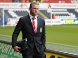 Manchester United's English striker Wayne Rooney arrives at the Liberty stadium for the English Premier League football match between Swansea City and Manchester United at Liberty Stadium in Swansea, south Wales, on August 17, 2013