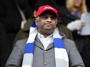 Fernandes backs Redknapp