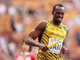 Jamaica's Usain Bolt smiles as he crosses the finish line to win gold in the Men's 4x100 metres at the World Championships in Moscow on August 18, 2013