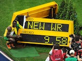 Jamaica's Usain Bolt celebrates winning the men's 100m final race of the 2009 IAAF Athletics World Championships and setting a new World Record time on August 16, 2009