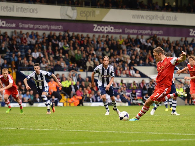 Rickie Lambert of Southampton scores the winning goal from the penalty spot during the Barclays Premier League match between West Bromwich Albion and Southampton at The Hawthorns on August 17, 2013