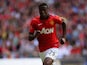 Wilfried Zaha of Manchester United runs for the ball during the FA Community Shield match between Manchester United and Wigan Athletic at Wembley Stadium on August 11, 2013