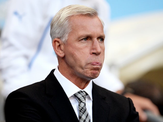 Newcastle boss Alan Pardew looks on as his side go 2-0 down to Man City on August 19, 2013