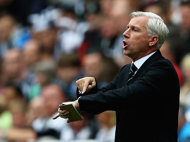 Newcastle boss Alan Pardew reacts on the touchline during the match against West Ham on August 24, 2013