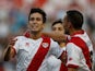 Rayo's Alberto Bueno celebrates with teammates after scoring against Elche on August 19, 2013