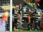 QPR's Andy Johnson celebrates with team mates after scoring the opening goal against Bolton on August 24, 2013