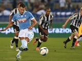 Lazio's Antonio Candreva scores a penalty against Udinese on August 25, 2013