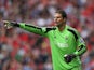 Asmir Begovic of Stoke City in action during the Barclays Premier League match between Liverpool and Stoke City at Anfield on August 17, 2013
