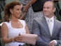 Manchester United footballer Wayne Rooney and his wife Coleen sit in the royal box to watch the men's singles final between Serbia's Novak Djokovic and Britain's Andy Murray on day thirteen of the 2013 Wimbledon Championships tennis tournament at the All 