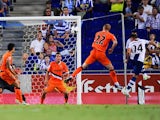 Espanyol's David Lopez heads home against Valencia on August 24, 2013