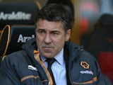 Then Wolves boss Dean Saunders, sitting in the dugout on April 16, 2013