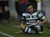Sporting's Diego Capel sits dejected after a missed chance against Pacos Ferreira  on May 5, 2013