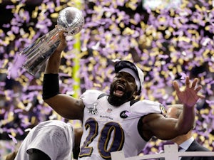 Ed Reed #20 of the Baltimore Ravens celebrates with the VInce Lombardi trophy after the Ravens won 34-31 against the San Francisco 49ers during Super Bowl XLVII at the Mercedes-Benz Superdome on February 3, 2013 