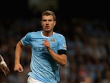 Edin Dzeko of Manchester City in action during the Barclays Premier League match between Manchester City and Newcastle United at the Etihad Stadium on August 19, 2013