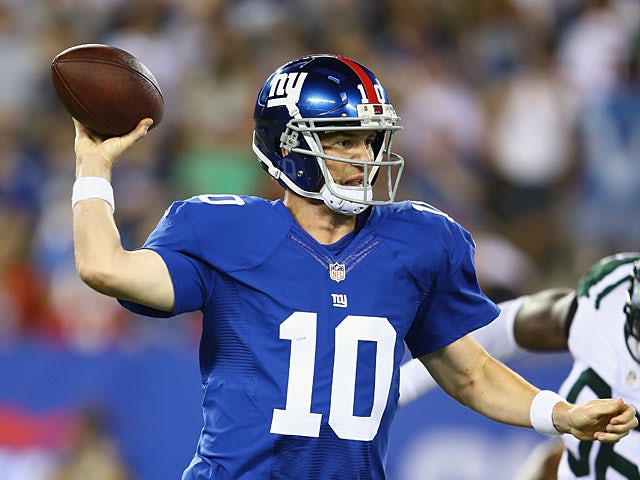 New York Giants' Eli Manning in action against New York Jets on August 24, 2013