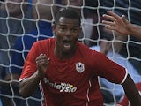 Cardiff striker Frazier Campbell wheels away to celebrate his goal against Man City on August 25, 2013