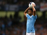 Gael Clichy of Manchester City takes a throw in during the Barclays Premier League match between Manchester City and Newcastle United at the Etihad Stadium on August 19, 2013
