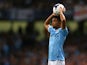 Gael Clichy of Manchester City takes a throw in during the Barclays Premier League match between Manchester City and Newcastle United at the Etihad Stadium on August 19, 2013
