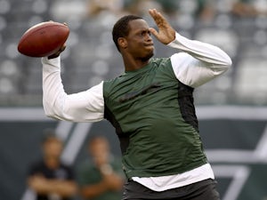 Geno Smith #7 of the New York Jets warms up before their preseason game against the Jacksonville Jaguars at MetLife Stadium on August 17, 2013