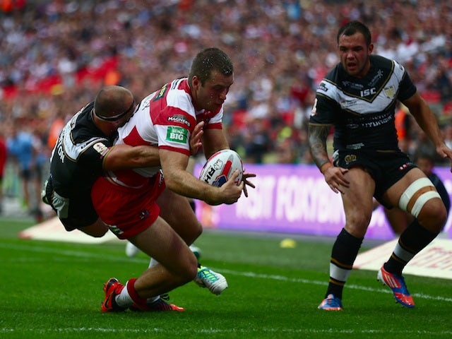 Wigan's Iain Thornley scores the first try of the Challenge Cup final against Hull FC on August 24, 2013