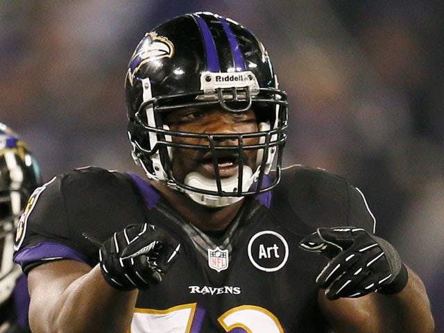 Inside linebacker Jameel McClain #53 of the Baltimore Ravens motions at the line of scrimmage against the Pittsburgh Steelers at M&T Bank Stadium on December 2, 2012