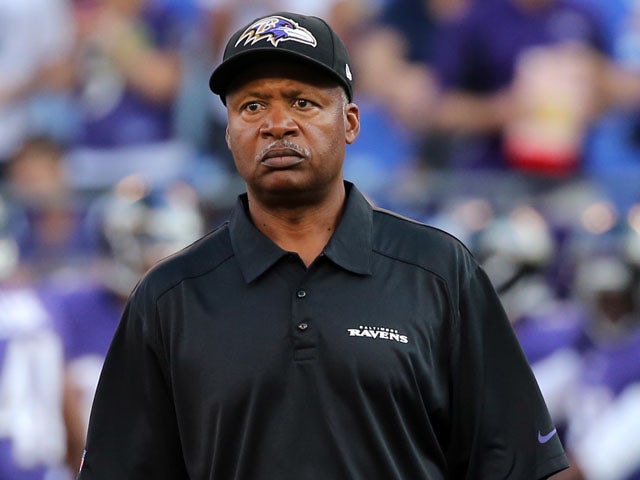 Baltimore Ravens offensive coordinator Jim Caldwell watches warm ups before the start of a preseason game against the Atlanta Falcons at M&T Bank Stadium on August 15, 2013