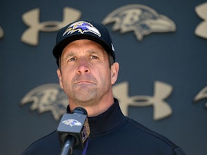 Harbaugh stands up for Ravens blockers