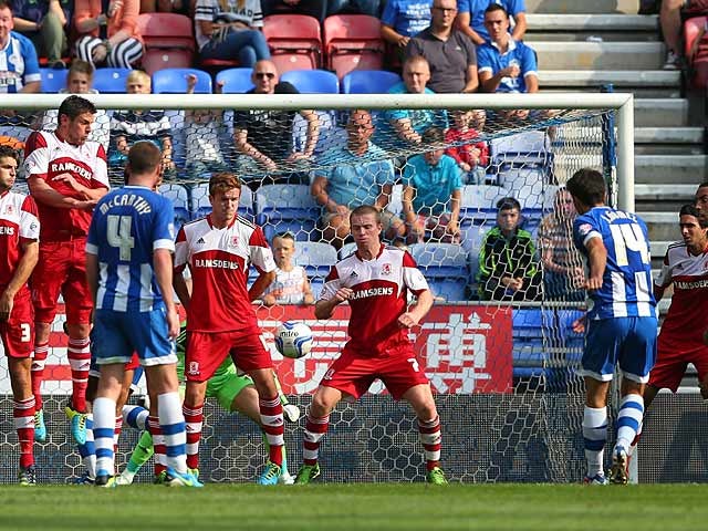 Wigan's Jordi Gomez scores the equaliser against Middlesbrough on August 25, 2013