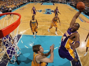 Los Angeles Lakers star Kobe Bryant rises high to dunk against the New Orleans Pelicans on April 22, 2011