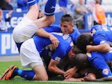 Leicester players bundle in celebration after a late winner against Birmingham City on August 24, 2013