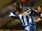 Wigan's Leon Barnett celebrates after scoring his team's equaliser during the match against Doncaster on August 20, 2013