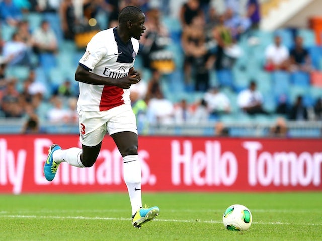 PSG defender Mamadou Sakho runs with the ball against Real Madrid on July 27, 2013