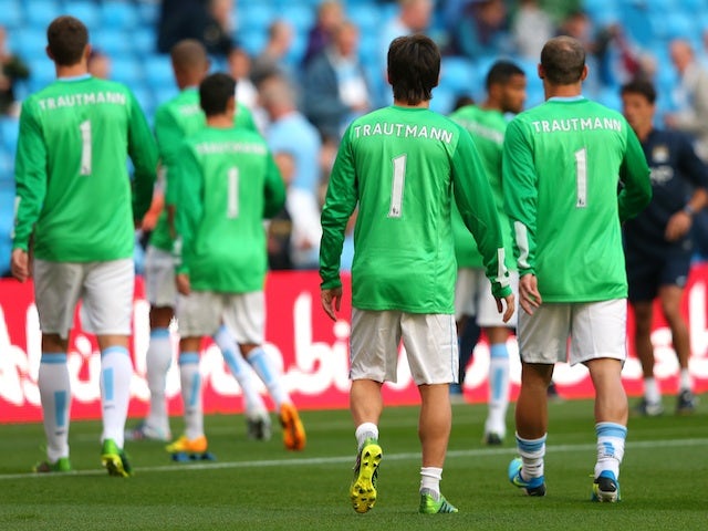 City players pay homage to legendary 'keeper Bert Trautmann, during the warming of the game with Newcastle on August 19, 2013