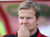 Caretaker manager of Swindon Town Mark Cooper in action during the pre season friendly between Tottenham Hotspur and Swindon Town at the County Ground on July 16, 2013