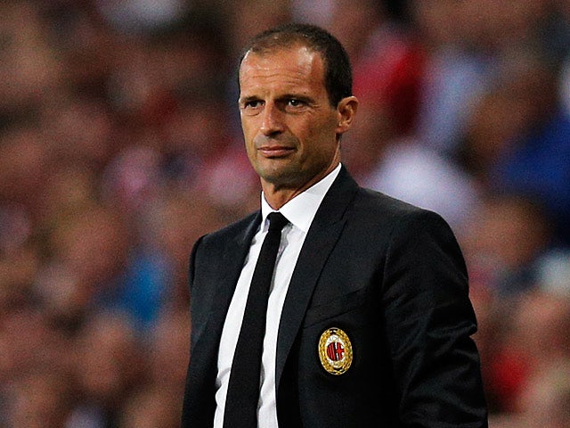 AC Milan manager Massimiliano Allegri on the touchline during the match against PSV Eindhoven on August 20, 2013