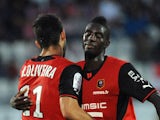 Rennes' Nelson Oliveira is congratulated following a goal against Evian on August 24, 2013