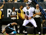 Nick Foles #9 of the Philadelphia Eagles carries the ball in for a touchdown against the Carolina Panthers on August 15, 2013