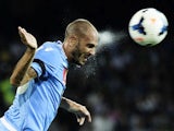SSC Napoli's captain Paolo Cannavaro heads the ball during the friendly match SSC Napoli vs Galatasaray at San Paolo Stadium in Naples on July 29, 2013