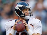 Denver Broncos' Peyton Manning in action against Seattle Seahawks on August 17, 2013