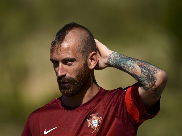 Portuguese midfielder Raul Meireles arrives for a training session at Praia Del Rey on June 4, 2013