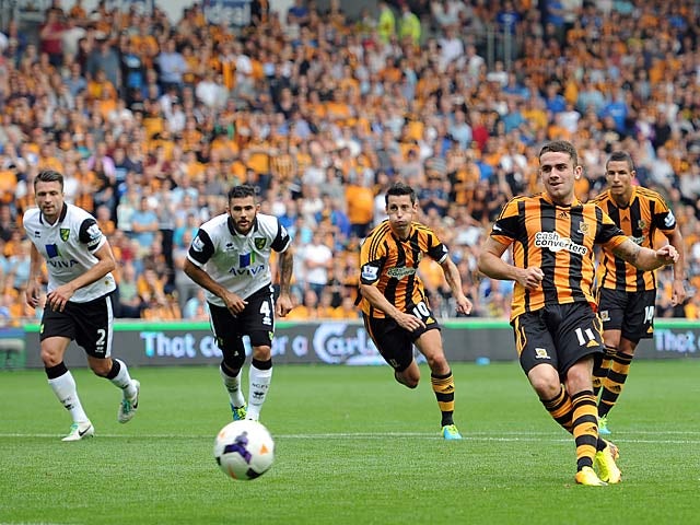 Hull's Robbie Brady scores the opening goal from the penalty spot against Norwich on August 24, 2013
