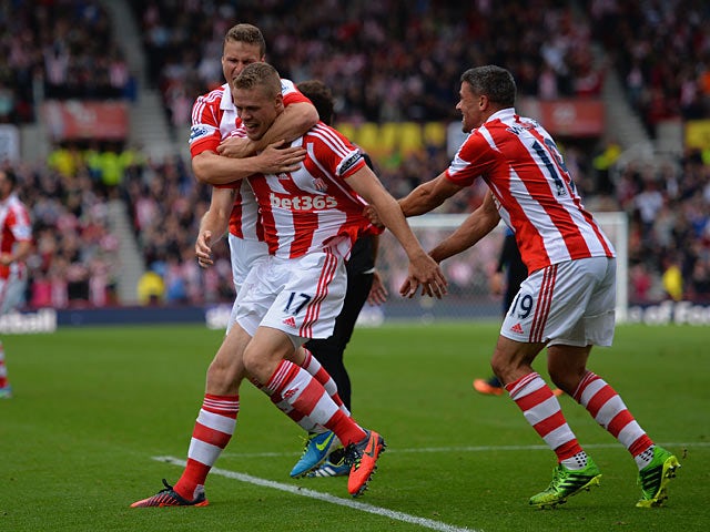 Stoke's Ryan Shawcross is congratulated by team mates after scoring his team's second goal against Crystal Palace on August 24, 2013