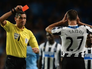 Ref Andre Marriner shows Steven Taylor a red card against Man City on August 19, 2013
