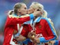 Gold medalist Tatyana Firova and Kseniya Ryzhova of Russia kiss on the podium during the medal ceremony for the Women's 4x400 metres Relay during Day Eight of the 14th IAAF World Athletics Championships Moscow 2013 at Luzhniki Stadium on August 17, 2013