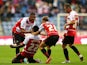 Doncaster's Theo Robinson is congratulated by team mates after scoring the opening goal against Wigan on August 20, 2013