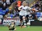 Bolton's Tim Ream and QPR's Charlie Austin battle for the ball on August 24, 2013