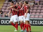 Preston's Tom Clarke is congratulated by team mates after scoring the opening goal against Coventry on August 25, 2013