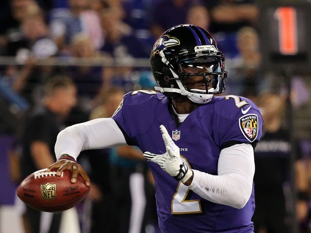 Quarterback Tyrod Taylor #2 of the Baltimore Ravens drops back to pass against the Atlanta Falcons during a preseason game at M&T Bank Stadium on August 15, 2013