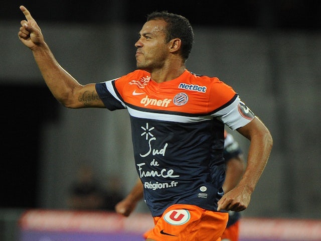 Montpellier's Vitorino Hilton celebrates a goal against Sochaux on August 24, 2013